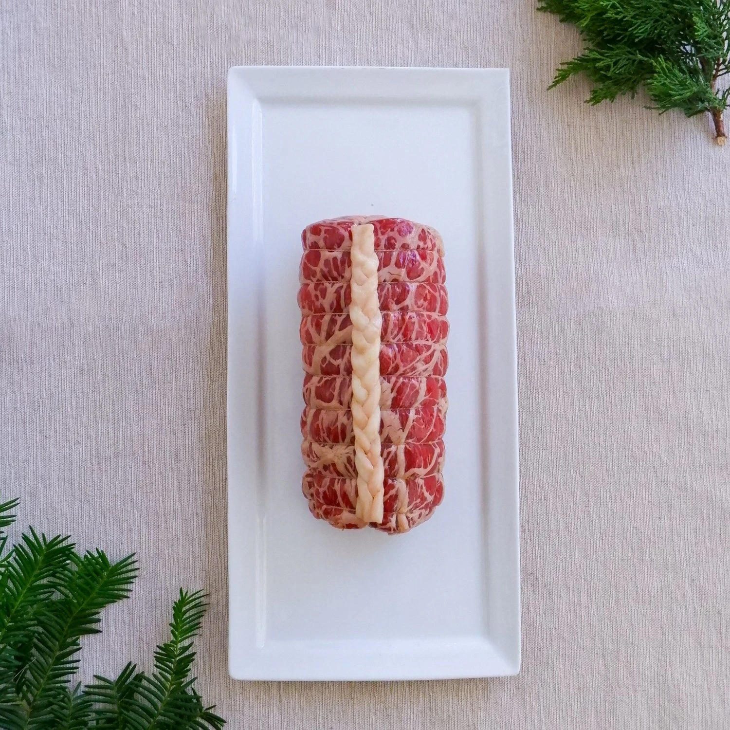 Classic Beef Rossini ingredients - beef tenderloin, foie gras, truffle and toasted bread